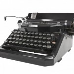 11813684-vintage-black-typewriter-isolated-on-white